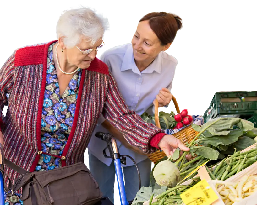 assisted-living-senior-woman-with-caregiver-shopping